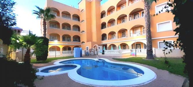 Coqueto apartamento en Villamartin, con parking, y fabulosa piscina comunitaria con zonas verdes., 75 mt2, 2 habitaciones