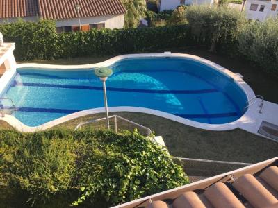 adosada con dos piscinas, 125 mt2, 4 habitaciones