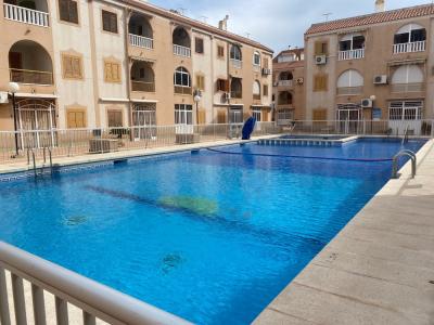 Apartamento 2 dormitorios con gran piscina comunitaria, 100 m de la playa, 54 mt2, 3 habitaciones
