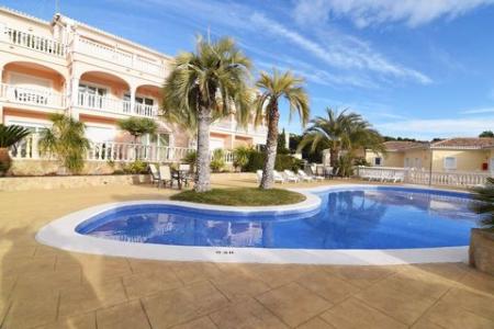 Apartamento de 2 dormitorios en Benissa Costa, con piscina comunitaria y vistas parciales al mar, a solo 1 km de la playa., 94 mt2, 2 habitaciones